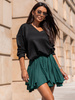 Rozkloszowana mini SPÓDNICA z asymetrycznym dołem zielona X312