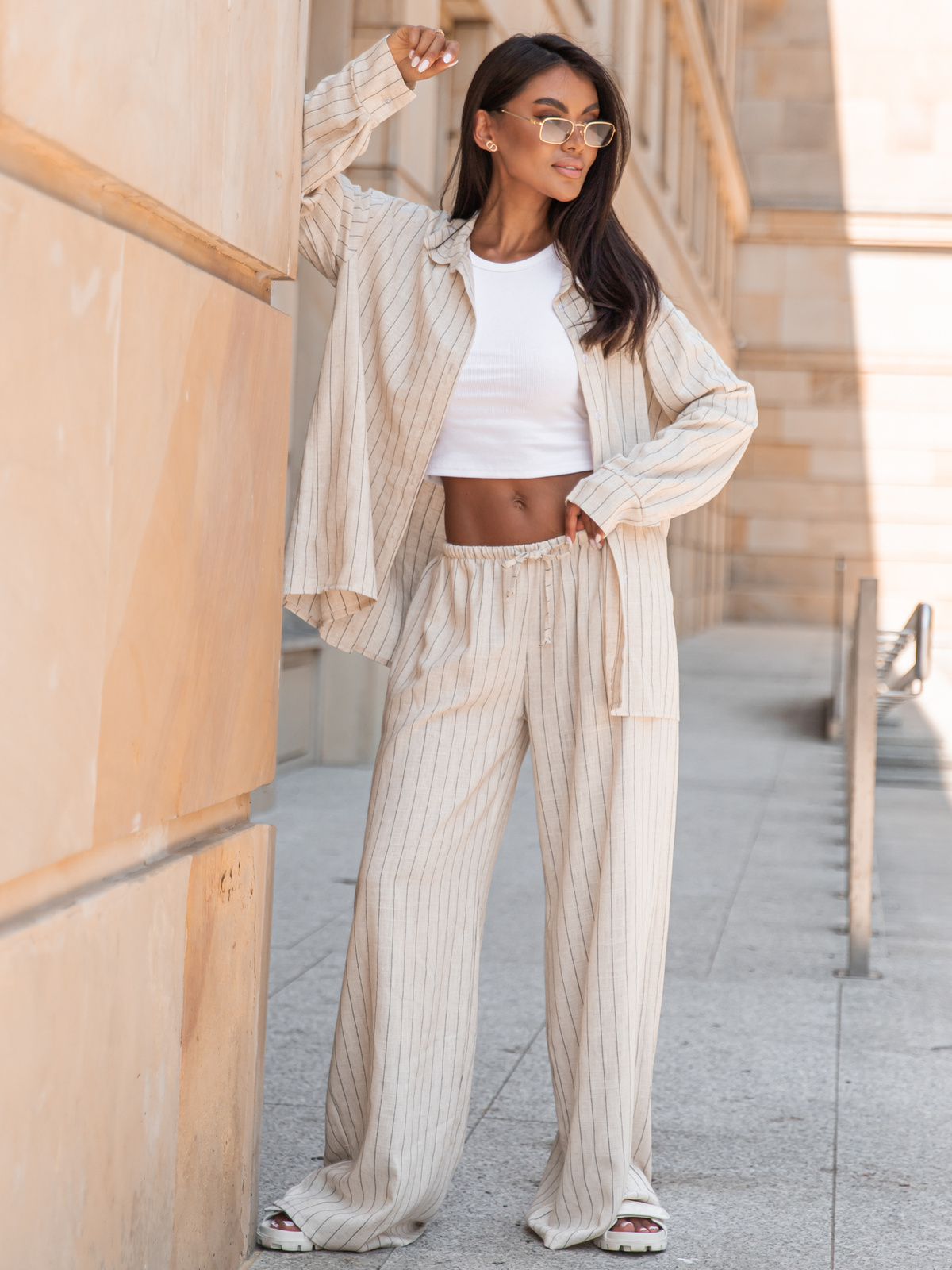 Lniane luźne długie SPODNIE z niższym stanem beżowe w tenisowy prążek X251 k01