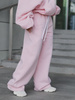 Dresowe bawełniane SPODNIE oversize ze średnim stanem z przeszyciami baby pink X401