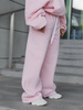 Dresowe bawełniane SPODNIE oversize ze średnim stanem z przeszyciami baby pink X401
