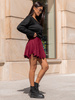 Rozkloszowana mini SPÓDNICA z asymetrycznym dołem bordowa X312