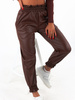 Joggery z wysokim stanem z eko skóry brązowe c365 k01