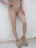 Dopasowane SPODNIE LEGGINSY z prążkowanej bawełnianej dzianiny z zamkiem beżowy E5 k01