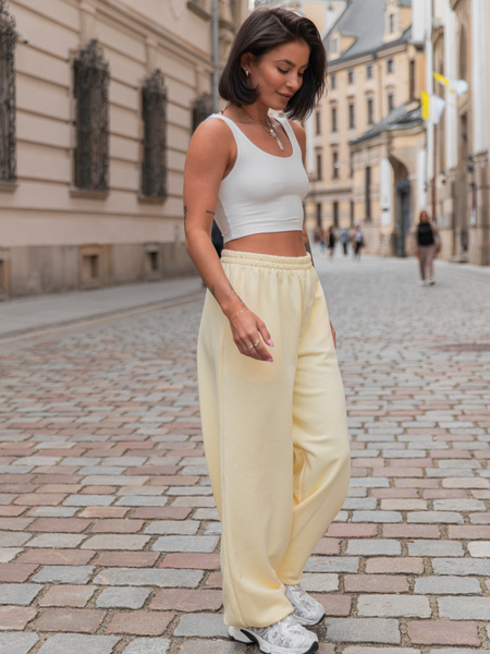 Luźne SPODNIE baggy z bawełnianej dresówki niedrapanej od wewnątrz butter yellow jasny żółty X151 k01