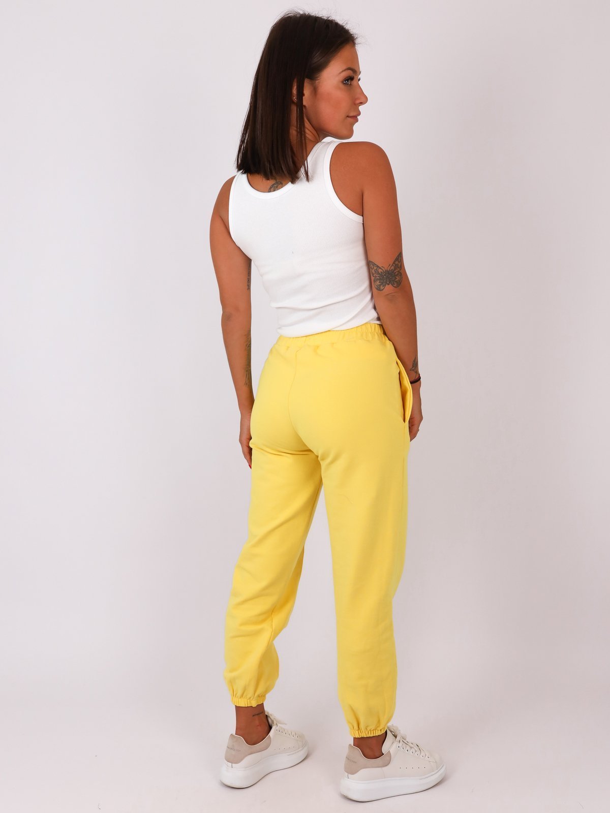 Bawełniane dresowe spodnie z przeszyciem żółte b11 kk01
