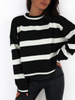 Oversizowy sweter w pasy o prostym splocie czarno biały k265